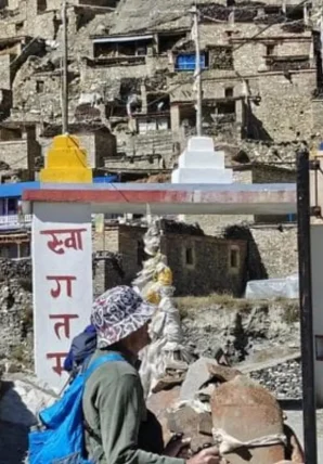 Annapurna Circuit Trek Guide Manang and Muktinath Charm Hiker exploring cultural landmarks and traditional architecture featured in the Annapurna Circuit Trek Guide.