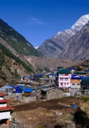 Annapurna Circuit Trek Guide Scenic Mountain Village Picturesque mountain village nestled under snow-capped peaks featured in the Annapurna Circuit Trek Guide.